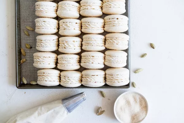 Golden Sugar Macarons with Cardamom Cream Cheese Filling | Domino® Sugar